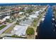 Aerial view showing a single-story home situated on a waterfront lot at 88 Sabal Dr, Punta Gorda, FL 33950