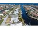 Wide aerial showcasing the home's waterfront lot and surrounding community at 88 Sabal Dr, Punta Gorda, FL 33950