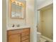 Clean bathroom with light wood vanity and shower at 88 Sabal Dr, Punta Gorda, FL 33950