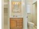 Bathroom featuring a light wood vanity and a shower at 88 Sabal Dr, Punta Gorda, FL 33950