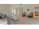 Bright living room with tiled floors and access to kitchen at 88 Sabal Dr, Punta Gorda, FL 33950