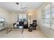 Relaxing living room with leather seating and large windows at 88 Sabal Dr, Punta Gorda, FL 33950