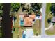 Property is shown from above, including the house, pool, and yard at 108 Mccabe St, Port Charlotte, FL 33953