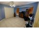 Bedroom with tile floors, a ceiling fan and large closet at 108 Mccabe St, Port Charlotte, FL 33953