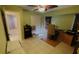 Bright bedroom with tile floors and built-in shelving at 108 Mccabe St, Port Charlotte, FL 33953