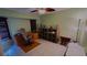 Home office features built-in shelving and a ceiling fan at 108 Mccabe St, Port Charlotte, FL 33953