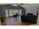 Bright living room with hardwood floors and plenty of natural light at 108 Mccabe St, Port Charlotte, FL 33953