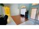 Open living area with hardwood floors and access to other rooms at 108 Mccabe St, Port Charlotte, FL 33953