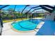 Inviting screened pool with canal view at 108 Mccabe St, Port Charlotte, FL 33953