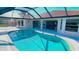 Relaxing screened pool and patio area at 108 Mccabe St, Port Charlotte, FL 33953