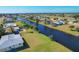 Aerial view showcasing the property's canal-front location at 102 Annapolis Ln, Rotonda West, FL 33947