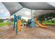 Modern playground with climbing structures and slides at 102 Annapolis Ln, Rotonda West, FL 33947