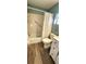 Bathroom with toilet, tub, and shower at 10454 Waterford Ave, Englewood, FL 34224