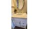 Bathroom vanity with sink and drawers at 10454 Waterford Ave, Englewood, FL 34224