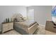 Serene bedroom with a double bed and neutral decor at 10628 Nicklaus Ct, Englewood, FL 34223