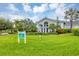 Resort-style community center with lush landscaping at 10628 Nicklaus Ct, Englewood, FL 34223