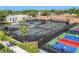 Aerial view of tennis and pickleball courts at 10628 Nicklaus Ct, Englewood, FL 34223