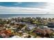 Aerial view of a house on a canal with beautiful waterfront views at 115 Sw Seville Sw Pl, Port Charlotte, FL 33952