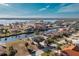 Aerial view of waterfront property with canal access and surrounding homes at 115 Sw Seville Sw Pl, Port Charlotte, FL 33952