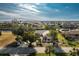 Aerial view of waterfront home with canal access and lush landscaping at 115 Sw Seville Sw Pl, Port Charlotte, FL 33952