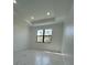 Bright bedroom with large window and marble flooring at 12547 Trinity Ave, Port Charlotte, FL 33953