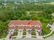 Aerial view of townhome with two-car garage and private yard at 1259 Jonah Dr, North Port, FL 34289