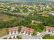 Aerial view of townhome with two-car garage and private yard at 1259 Jonah Dr, North Port, FL 34289