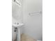 Small half bathroom with pedestal sink at 1259 Jonah Dr, North Port, FL 34289