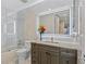 Elegant bathroom with granite countertop and a large mirror at 1340 Rock Dove Ct # 134, Punta Gorda, FL 33950