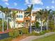 Charming building with palm trees and a fountain at 1340 Rock Dove Ct # 134, Punta Gorda, FL 33950