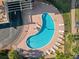 Aerial view of community pool and deck at 1340 Rock Dove Ct # 134, Punta Gorda, FL 33950