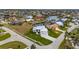 Aerial view of waterfront home with pool and private dock at 1380 Willet Ct, Punta Gorda, FL 33950