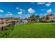 Landscaped backyard with canal and neighborhood views at 1380 Willet Ct, Punta Gorda, FL 33950