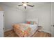 Bright bedroom with king-size bed and wood floors at 1380 Willet Ct, Punta Gorda, FL 33950