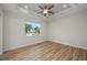 Spacious bedroom with water views and wood floors at 1380 Willet Ct, Punta Gorda, FL 33950