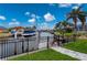 Private boat dock with lift and seating area, offering waterfront access at 1380 Willet Ct, Punta Gorda, FL 33950