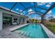 Enjoy this relaxing screened pool and patio area at 1380 Willet Ct, Punta Gorda, FL 33950