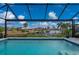 Refreshing screened pool overlooking the canal at 1380 Willet Ct, Punta Gorda, FL 33950