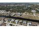 Aerial view of canal front property with homes at 143 Rotonda Cir, Rotonda West, FL 33947