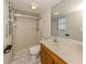 Bathroom with shower/tub combo, toilet, and vanity with a mirror at 143 Rotonda Cir, Rotonda West, FL 33947