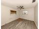 Bedroom with hardwood floors and window coverings at 143 Rotonda Cir, Rotonda West, FL 33947