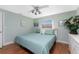 Spacious bedroom featuring a king-size bed and calming decor at 160 Salem Nw Ave, Port Charlotte, FL 33952