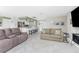 Living room with neutral color palette and view into kitchen at 160 Salem Nw Ave, Port Charlotte, FL 33952