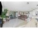 Spacious living room with access to a patio and pool area at 160 Salem Nw Ave, Port Charlotte, FL 33952