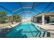 Refreshing screened pool with spacious patio at 160 Salem Nw Ave, Port Charlotte, FL 33952