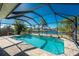 Inviting screened-in pool with canal views at 160 Salem Nw Ave, Port Charlotte, FL 33952