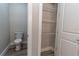 Small bathroom with toilet and additional storage at 16305 Branco Dr, Punta Gorda, FL 33955