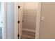 Well-lit closet with wire shelving and a modern door at 16305 Branco Dr, Punta Gorda, FL 33955