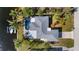 Aerial view showing house, pool, boat, and canal-front property at 18170 Avonsdale Cir, Port Charlotte, FL 33948