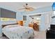 Bright bedroom with a queen bed and window seat at 18170 Avonsdale Cir, Port Charlotte, FL 33948